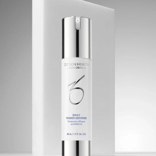 ZO Skin Health Daily Power Defense skincare bottle with silver cap on white background