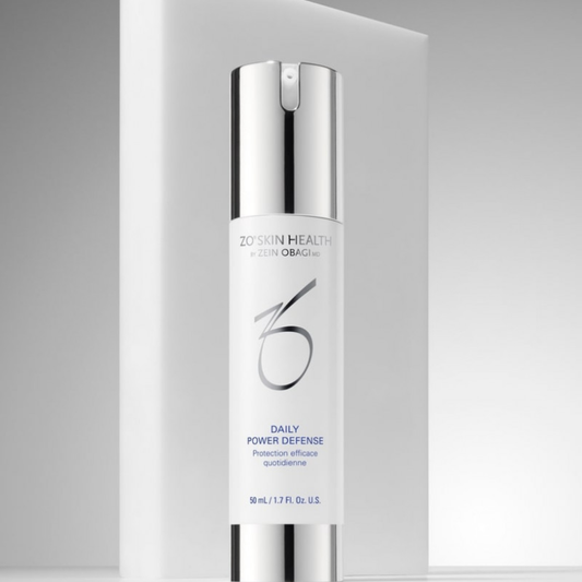 ZO Skin Health Daily Power Defense skincare product bottle with silver cap on white background