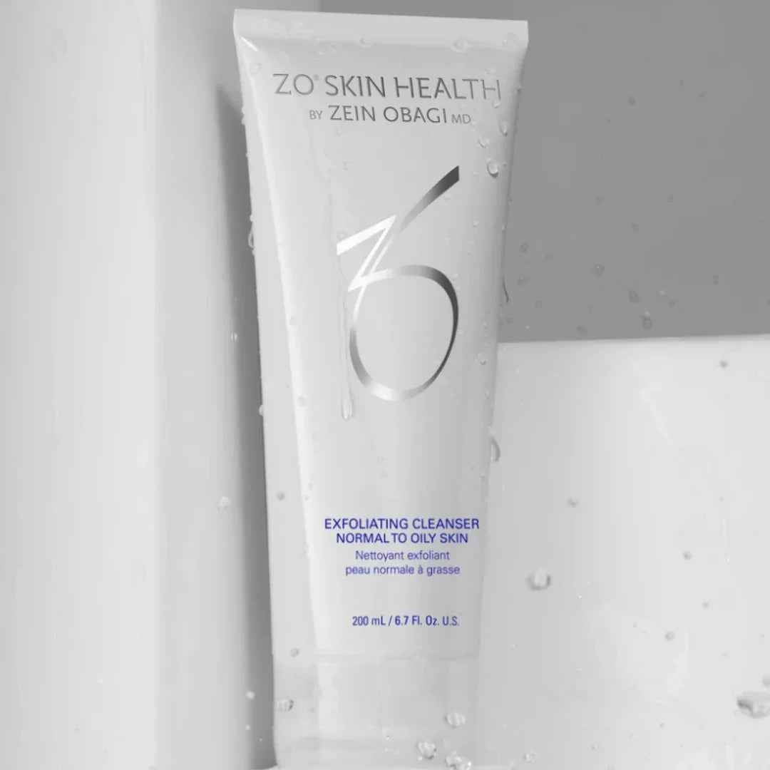 Tube of ZO Skin Health exfoliating cleanser for normal to oily skin with water droplets