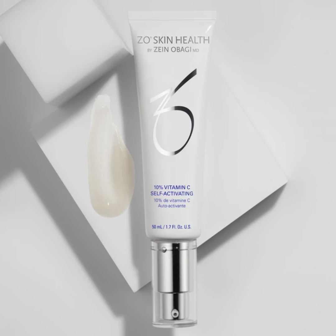 ZO Skin Health 10% Vitamin C Self-Activating serum tube with cream swatch on white geometric background