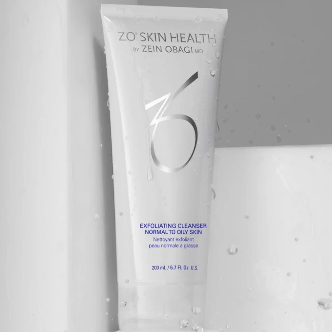 Tube of ZO Skin Health exfoliating cleanser for normal to oily skin with water droplets