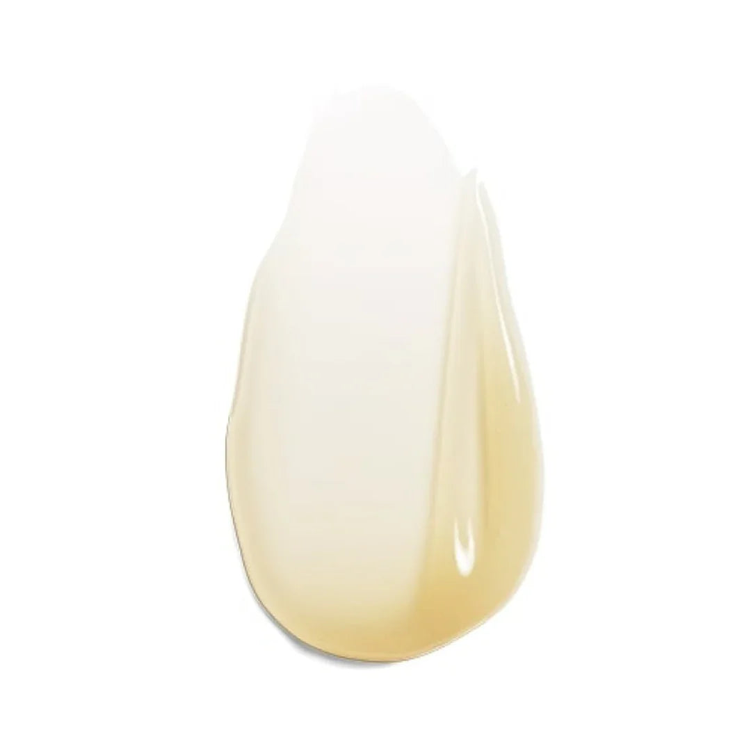 Close-up of translucent beige serum drop on white background, highlighting smooth skincare texture