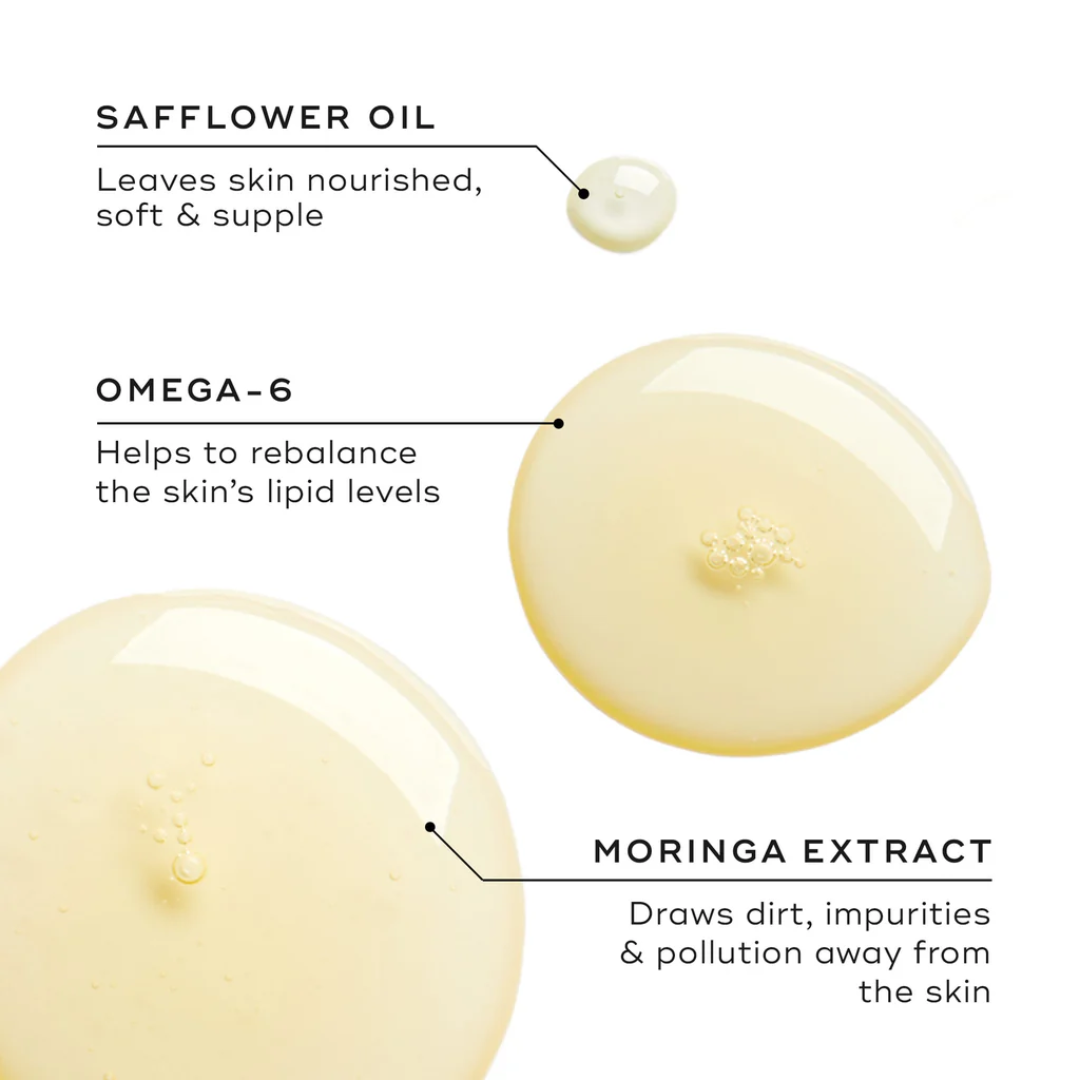 Cleansing oil drops with labels for safflower oil, omega-6, and moringa extract benefits