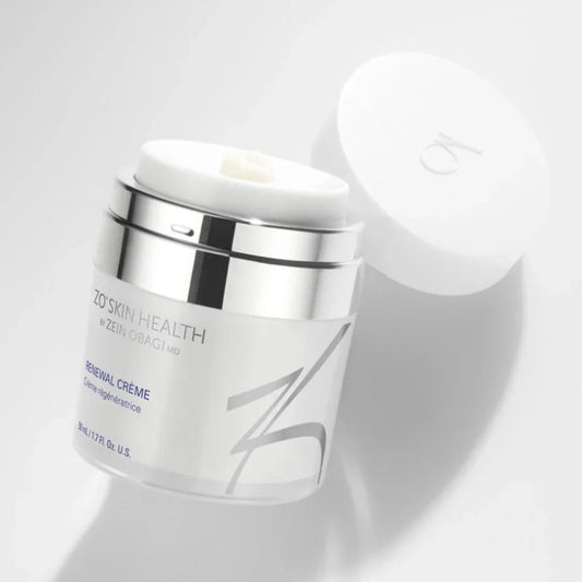 Open jar of ZO Skin Health Renewal Crème with white lid and silver accents on white background