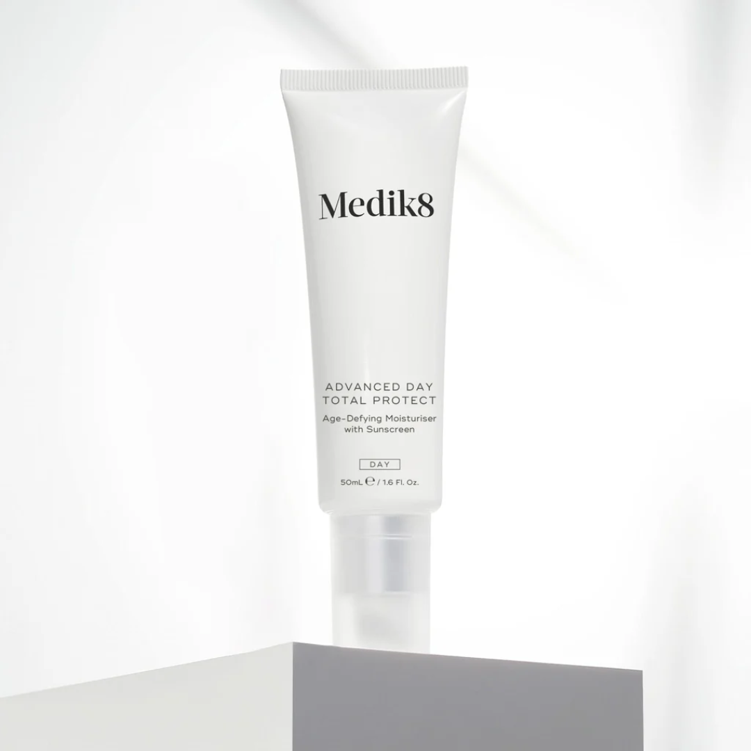 Medik8 Advanced Day Total Protect age-defying moisturizer with sunscreen, 50mL tube on white background
